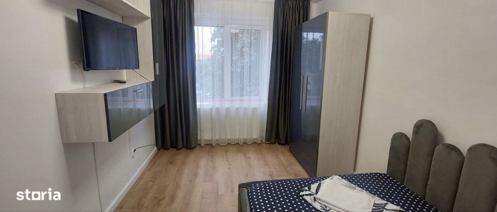 Inchiriez apartament in regim hotelier .