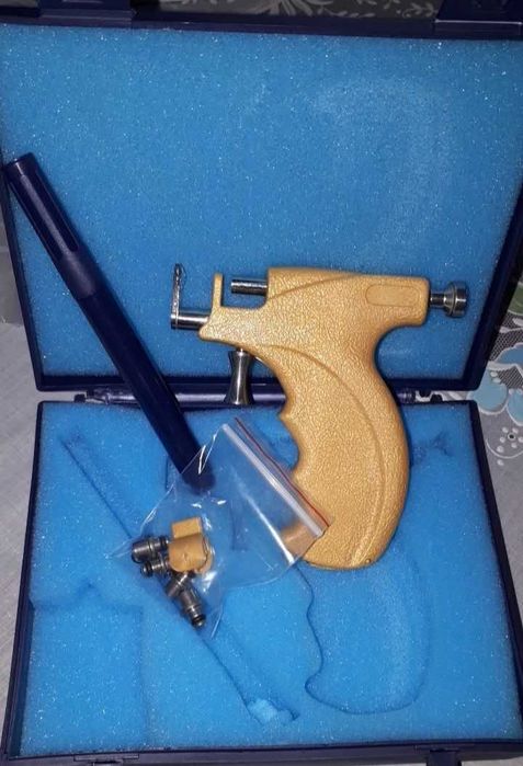 ишлатилмаган янги кулок    тешиш   мосламаси