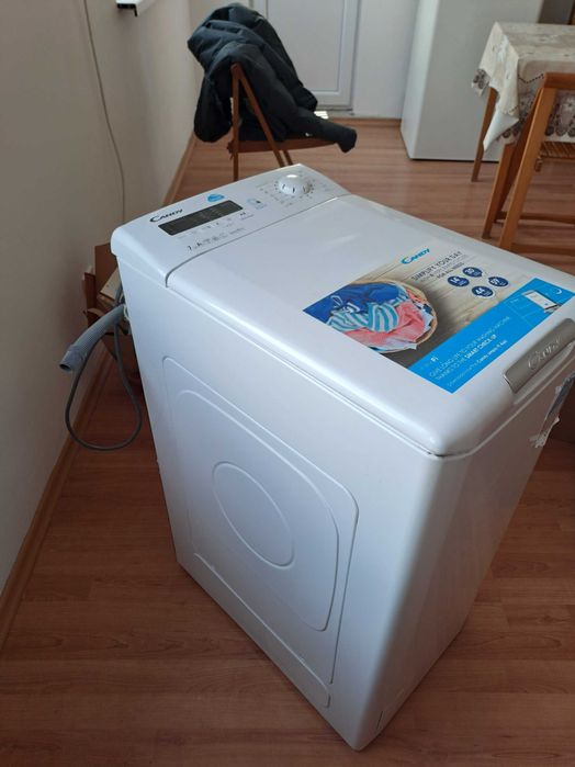 Пералня Candy с горно пълнене