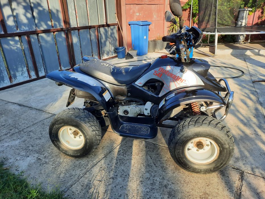 Vand ATV DEFENDER 50 impecabil la SUPER PRET!