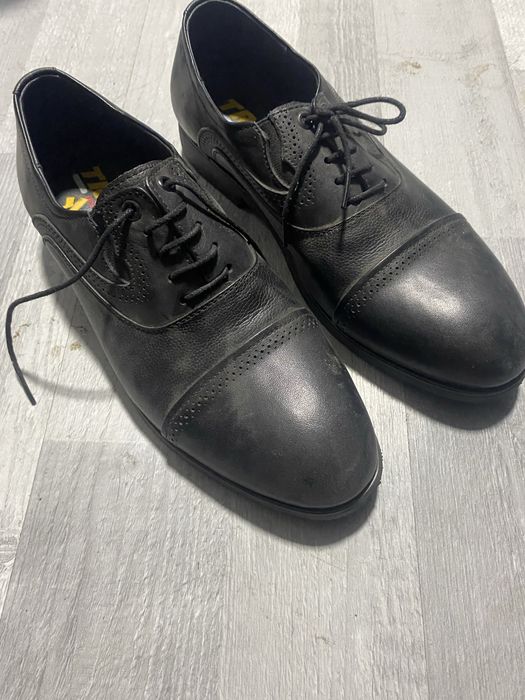 новые, неиспользованные мужские туфли