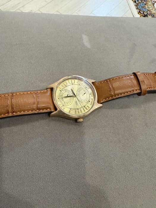 Золотые часы ника