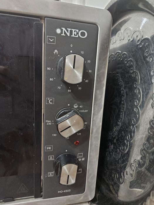 Продам электрическую печь Neo