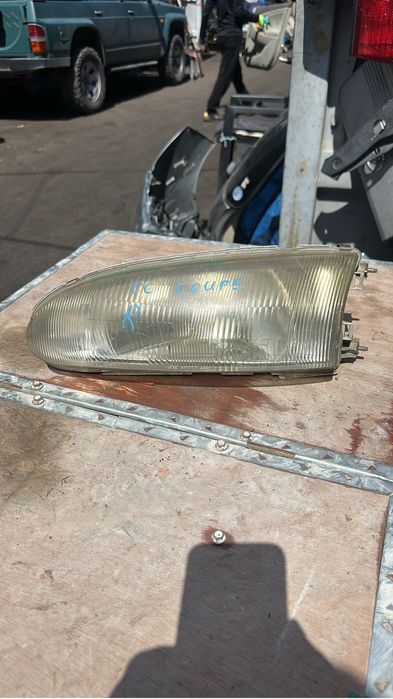 Левая фара на Mitsubishi Mirage