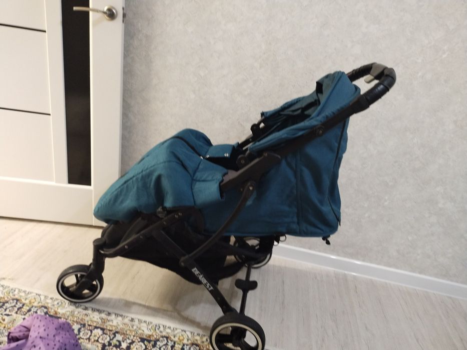 Бала сүйрететін арба. Коляска детский