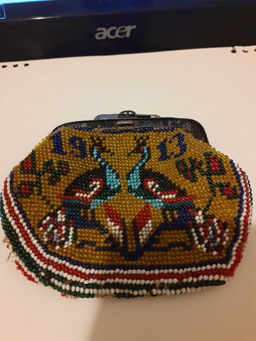 Старо портмоне на 112 години