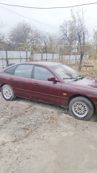 Машина Mazda кронс