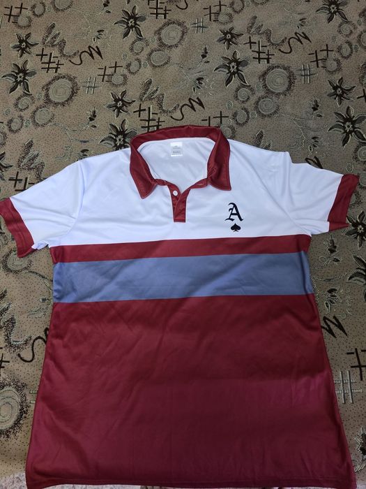 Продаю  футболку  поло