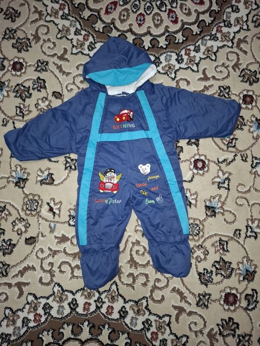 Продам детский теплый комбинезон