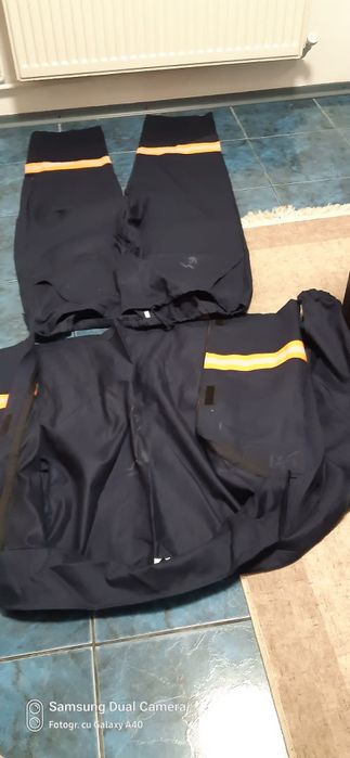 Combinizon doc și salopeta de munca