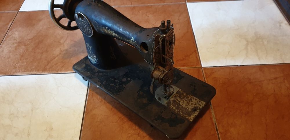 Mașină de cusut Singer