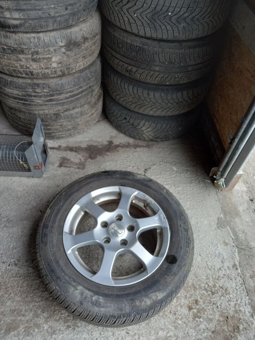 Vând  trei jante aliaj cauciucuri iarna 255/55R15 preț  negociabil rel