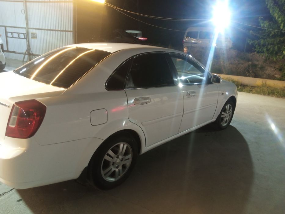 Ласетти 2011.  2 позится