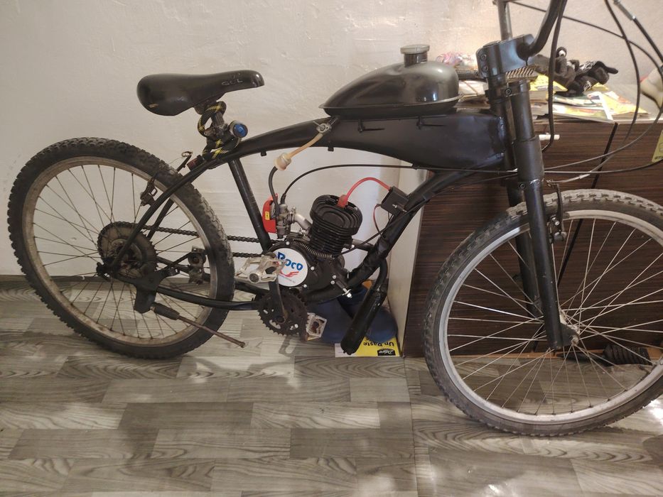 Vând bicicleta cu motor de 100cc