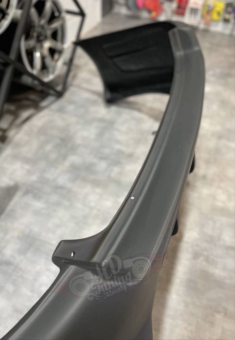 Бампер задний Toyota Caldina