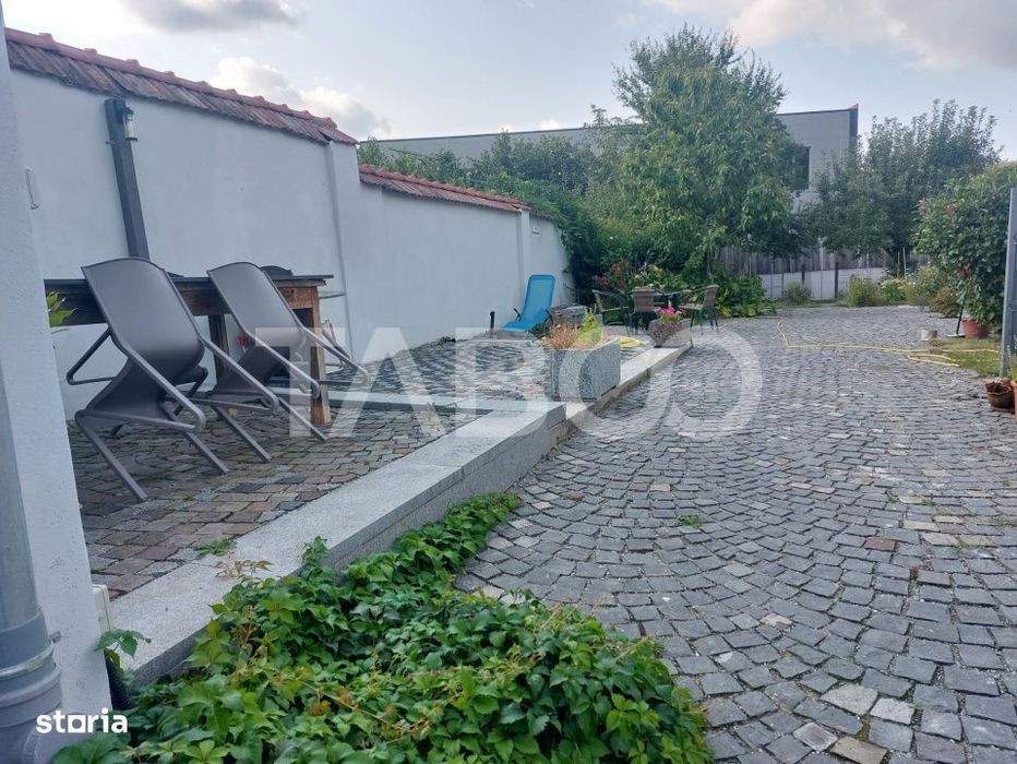 Apartament de vanzare 105 mp 3 camere curte 340 mp in acte Cisnadie