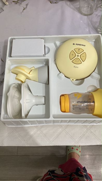 Молокоотсос Medela