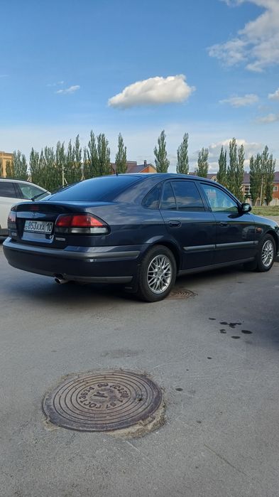Мазда 626 птичка