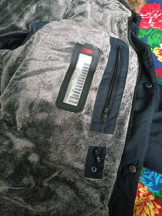 Продам пуховик мужской