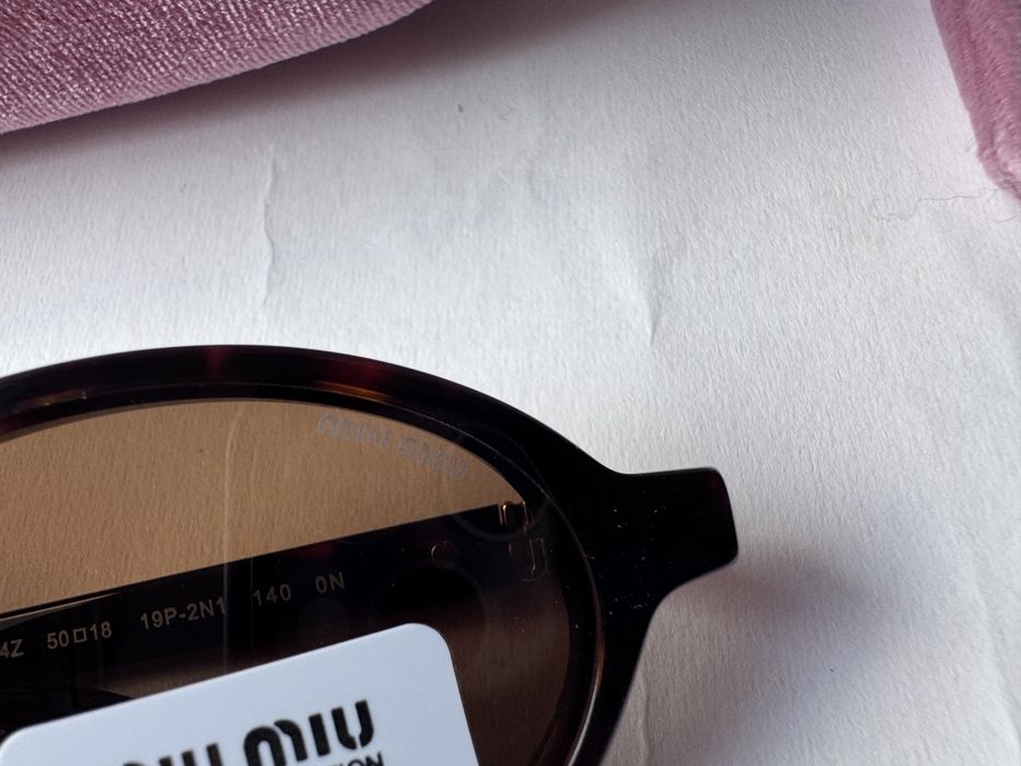 Ochelari de soare Miu Miu Oval SMU04Z 50-18 140, Noi