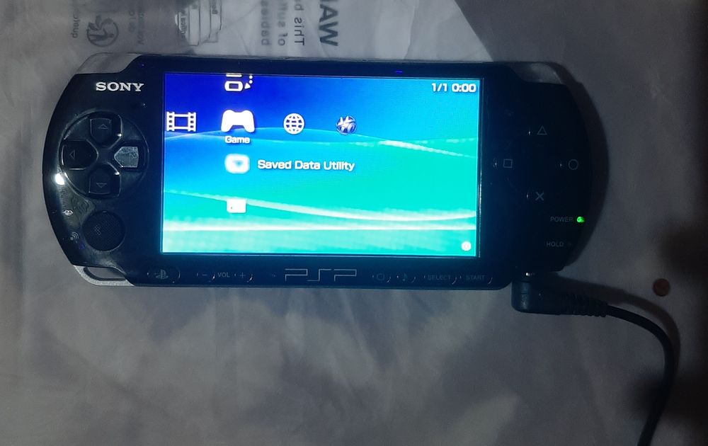 Vand psp în stare bună 3003 cu god of war