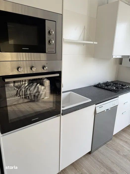 Central - Vanzare apartament 3 camere - Str. Al. Papiu Ilarian — fotografia 1