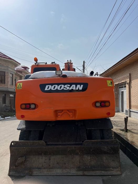 Экскаватор Doosan 140.