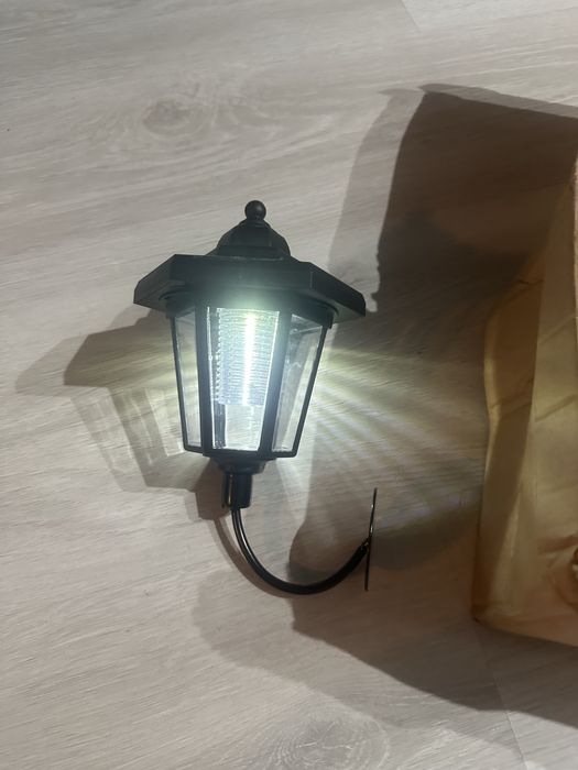 Set de 4 lampi solare de perete, tip lumina de veghe