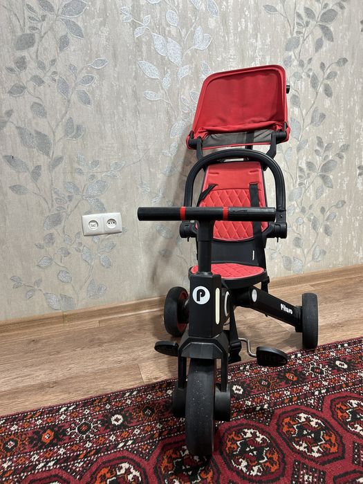 Трехколесный велосипед.