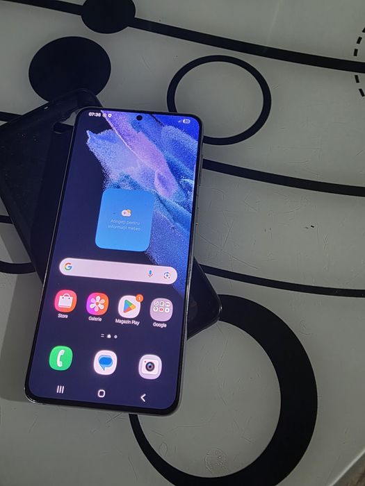Samsung s21 plus crăpat usor fata spate funcționează impecabil.