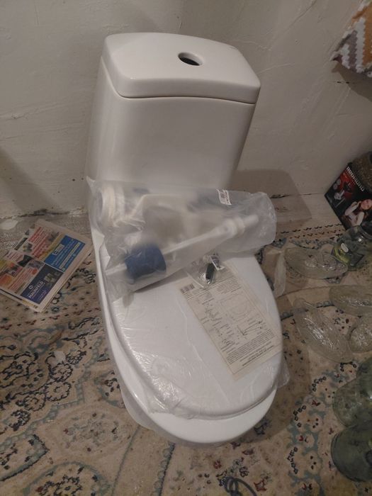 Новый,не использованный унитаз