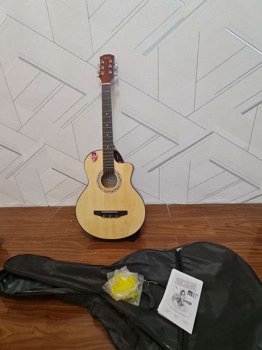 Продаю совершенно новую гитару