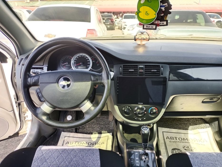 Laseti  Chevrolet 2013 yil xolati alo  avtomat  139ming yurgani halol