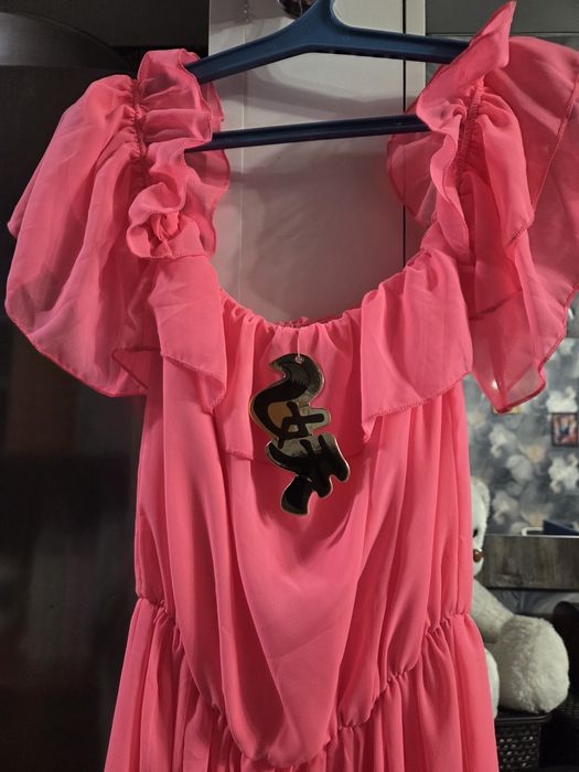 Платье новое размера L .