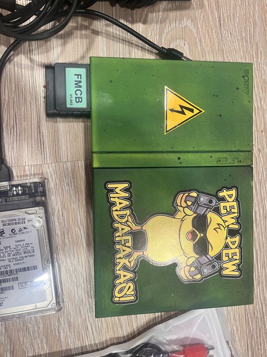 Ps2 slim c FreeMcBoot +320gb хардиск + безжичен джойстик + общо 63 игр