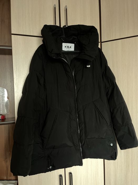 Продам пуховик теплый