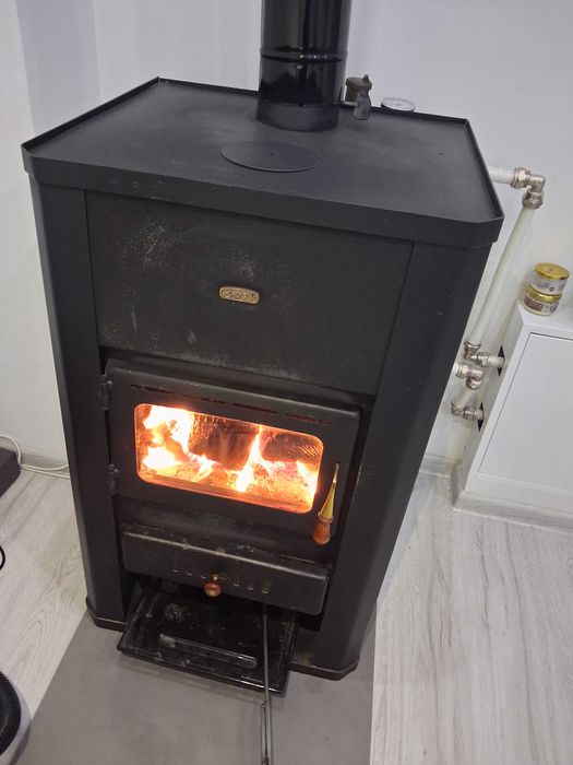 Камина Прити17Kw на твърдо гориво