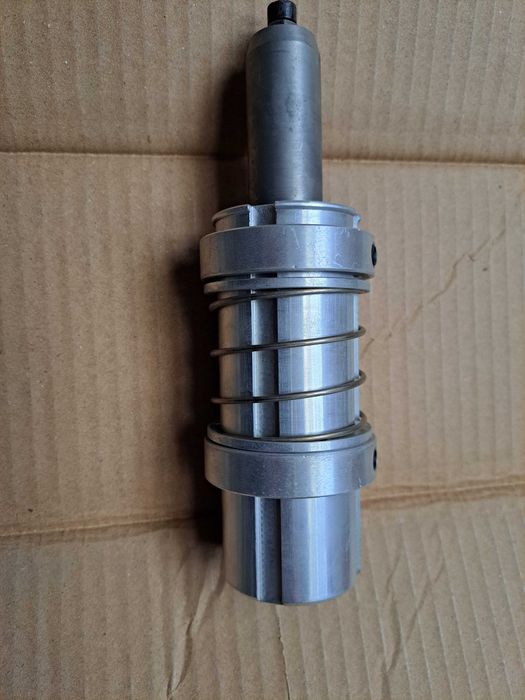 Adaptor pentru mașini CNC