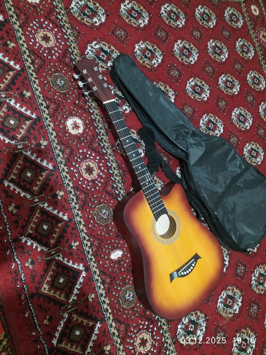 Гитара сотилоди тозо