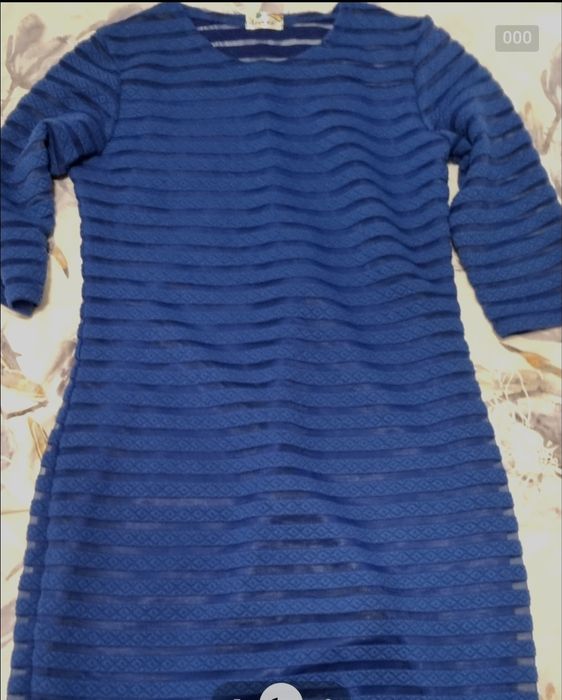 Дамска рокля на Sweet lady, S/M.Роклята е финно плетиво.