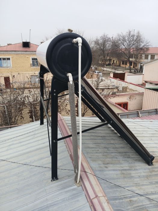 Quyosh suv isitgich oʻrnatish/Солнечный водонагревател установка