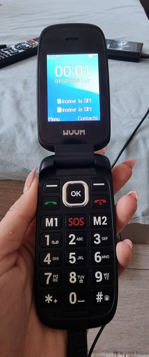 Телефон с копчета  Wuun