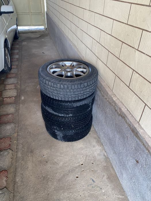 Диски шинами зимный