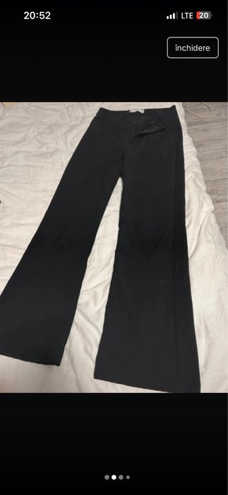pantaloni evazati de material Mango, eleganti