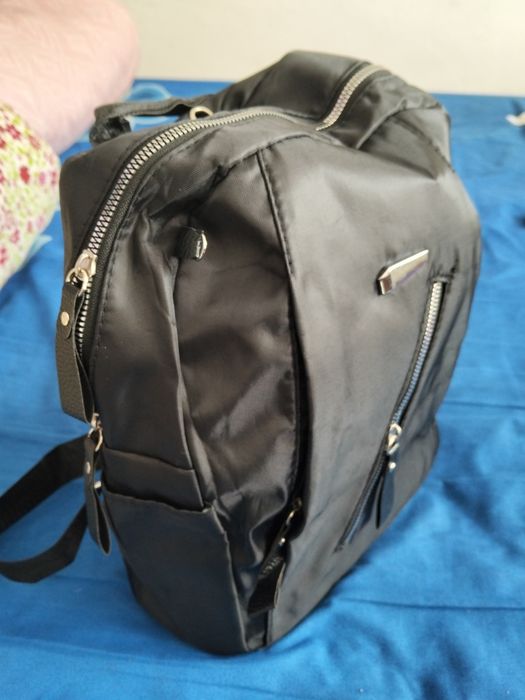 Rucsac încăpător cu buzunare