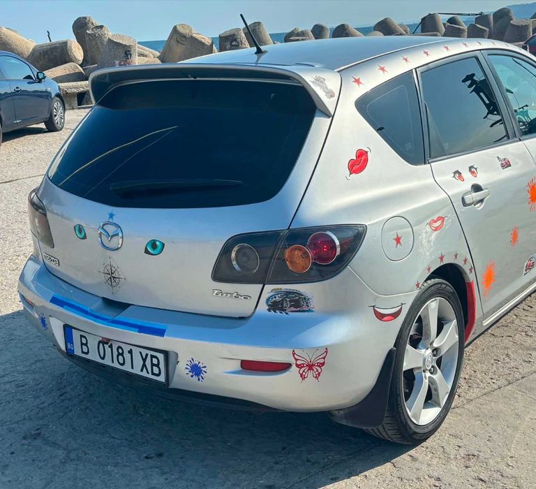 Автомобил Мазда 3