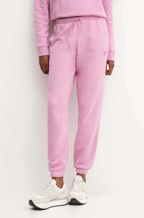 Pantaloni trening femei roz 100075640 Reebok FRENCH TERRY marimea XS