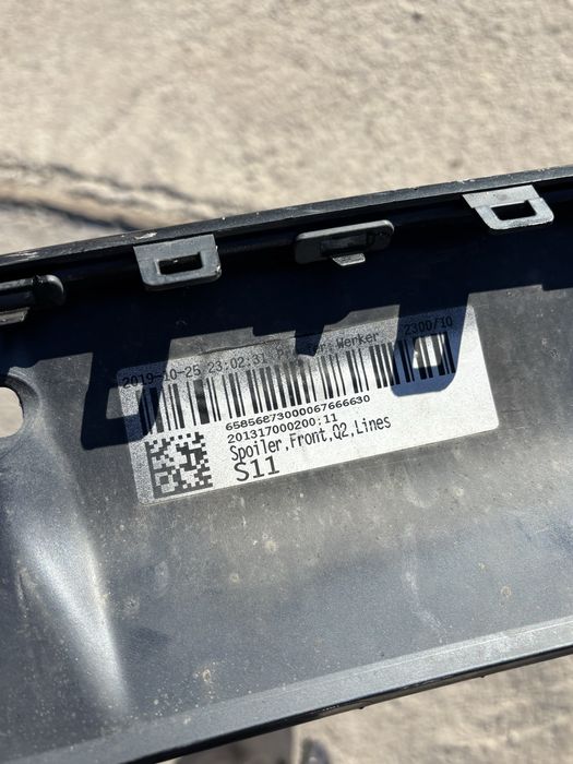 спойлер/добавка за предната броня на audi Q2 81A807110B