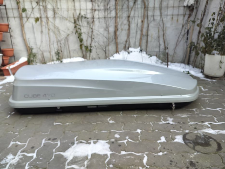 Cutie portbagaj  ca și nouă