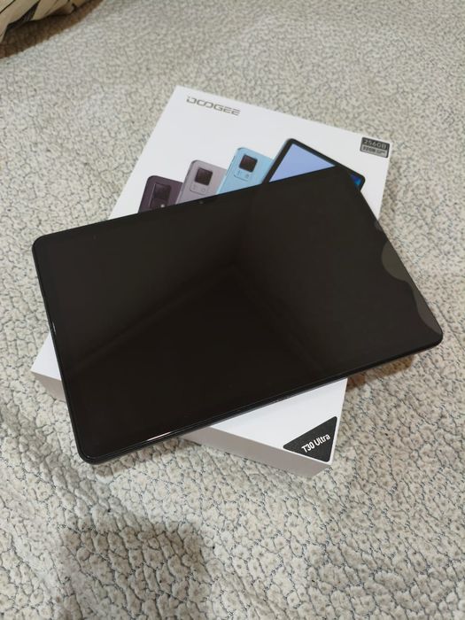 Планшет Doogee в хорошом состоянии.